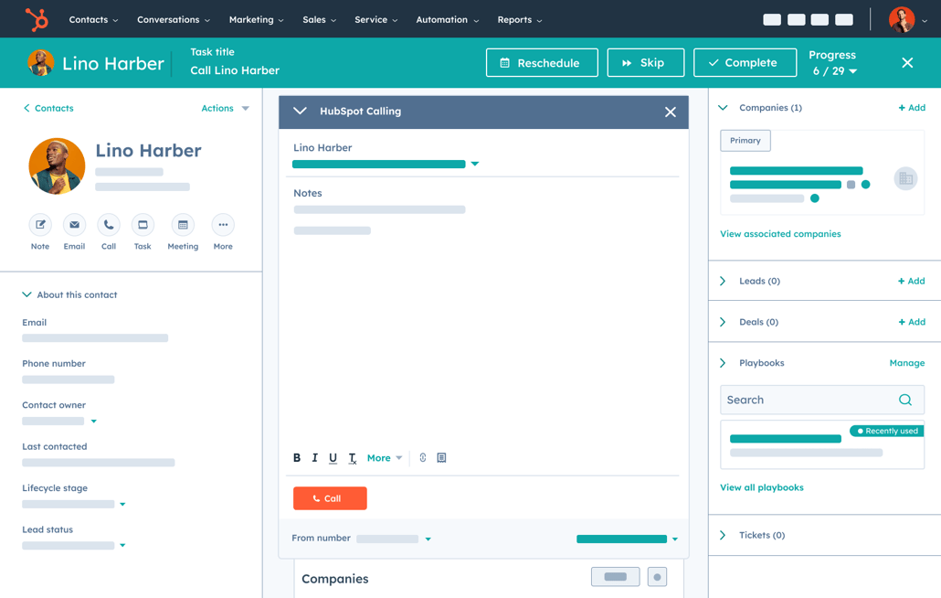 HubSpot call tracking software interface showing a user's call queue alongside the customer's contact details 