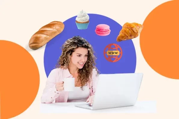 Woman on laptop looking at bakery website design examples