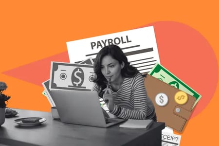 Woman at computer looking at payroll services for startup