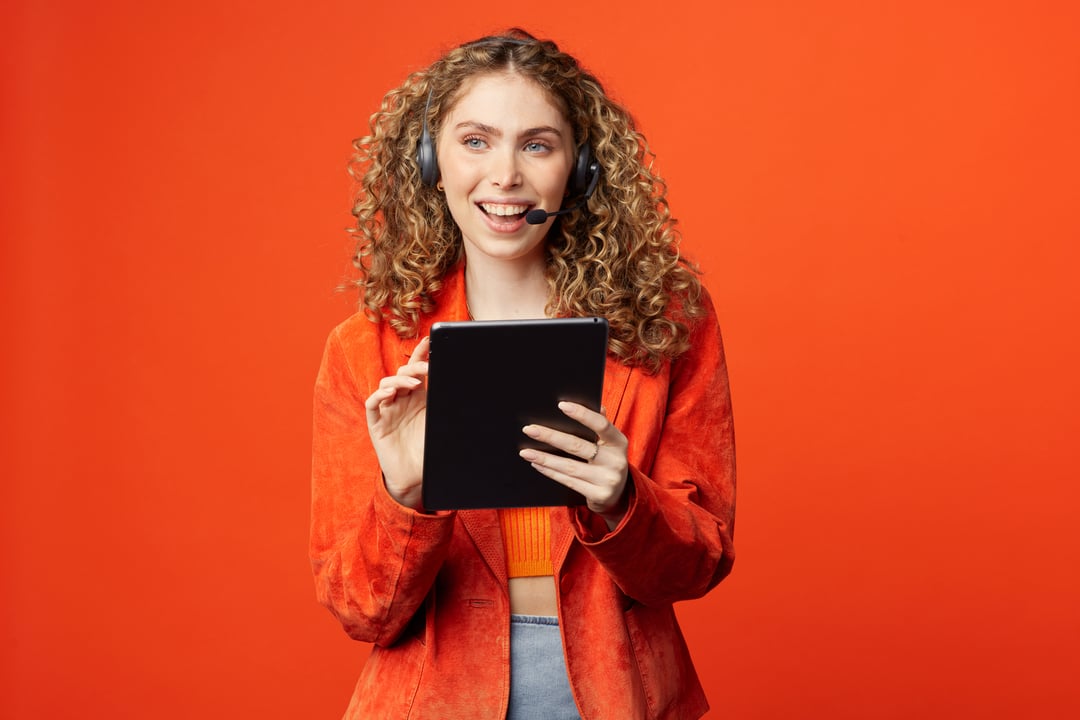 Worker with headset holding ipad