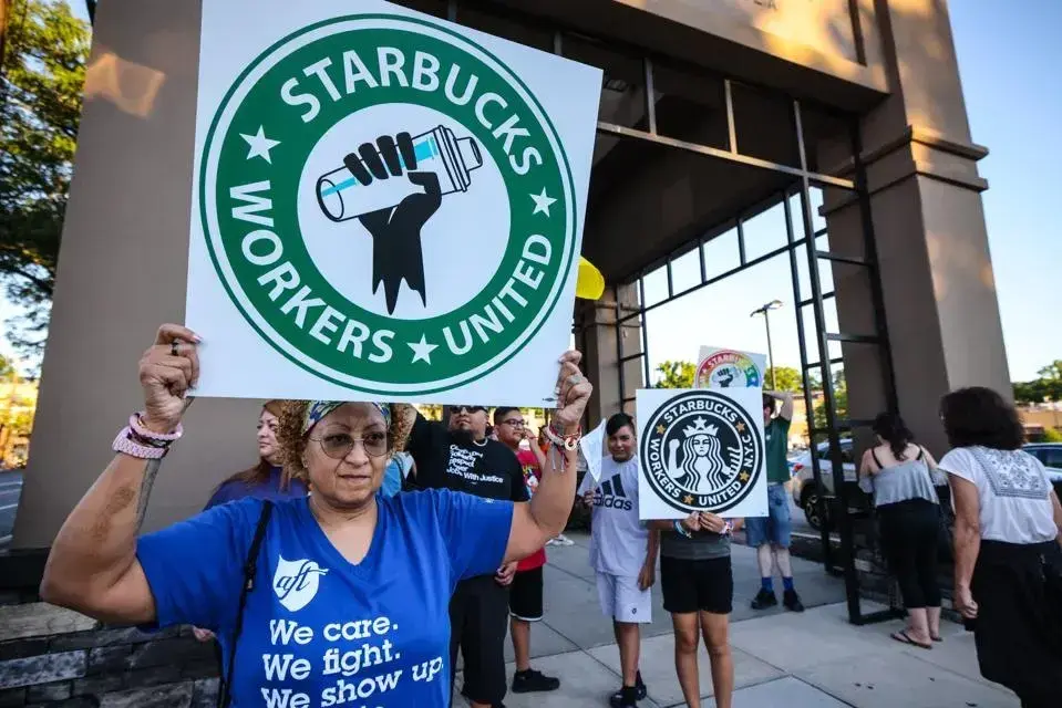 image of starbucks protest from getty/newsday in forbes article