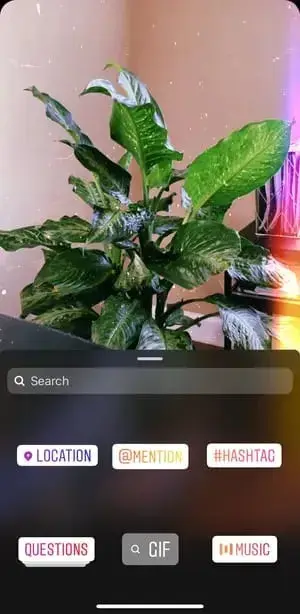 screenshot showing the process of filtering and adding stickers to an instagram story.