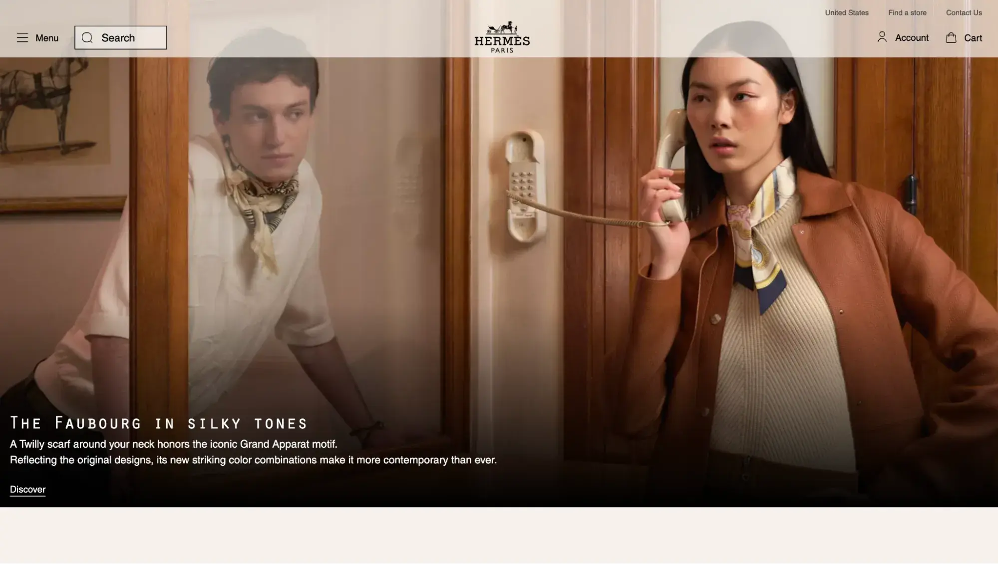 Luxury websites: Hermes’ homepage features a typewriter-style font and a full-screen hero image of two models wearing the brand’s clothing