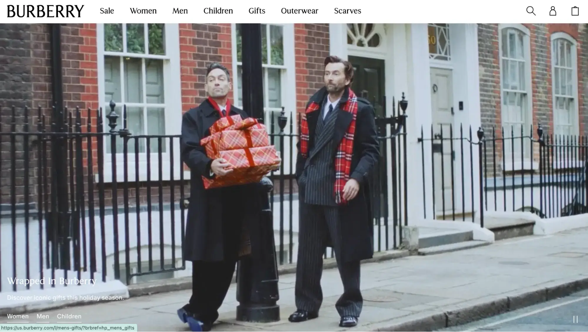 Burberry elegant website with two men wearing the Burberry Check scarves